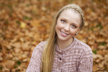 Fototapeta premium Portrait close up of young beautiful blonde girl