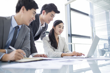 Young business person talking in meeting