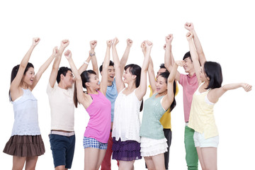 Group of young people raising arms