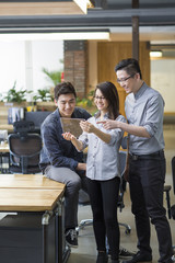 IT workers developing digital tablet