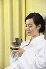 Woman drinking tea at a spa