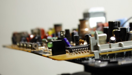 Radio components on electronic board closeup 