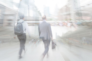 motion blur businessman walking to work