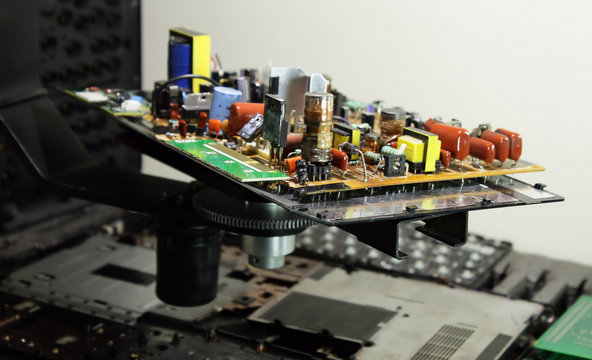 Electronic board with radio components at electronics plant conveyor