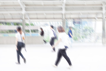 motion blur business people walking to work