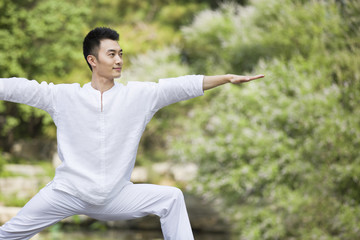 Young man practicing yoga