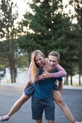 Hipster couple having fun together on a summers day