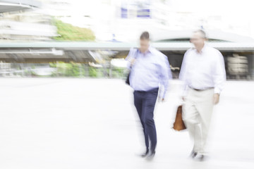 motion blur businessman walking
