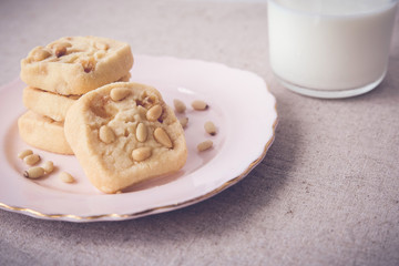 Homemade ginger and pine nut cookies, selective focus, toning