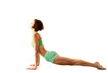 Fototapeta premium beautiful young girl engaged in yoga, gymnastics, fitness