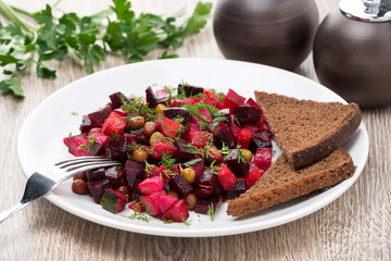 traditional Russian vegetable salad with beetroot - vinaigrette
