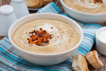 vegetable cream soup with caramelized carrots, closeup