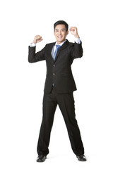 Businessman arms raised in celebration