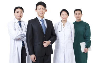 Confident businessman with medical team