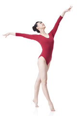 Fototapeta premium Female gymnast performing rhythmic gymnastics