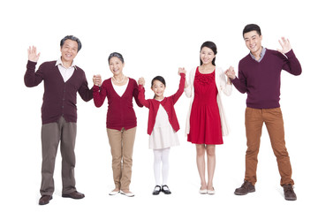 Obraz premium Cheerful family holding hands