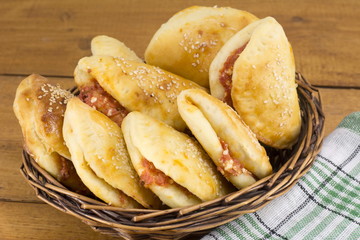 pizza buns with small sausages and pepperoni