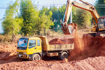 wheel loader excavator machine loading dumper truck © prapholl