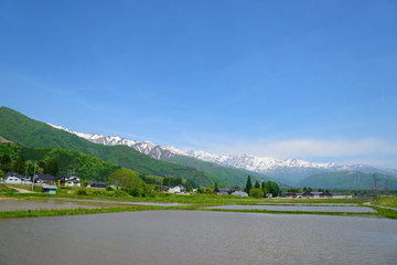 Obraz premium Ushiro-tateyama mountains, a part of Northern Alps, and countryside