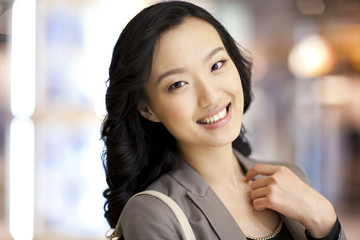 Portrait of cheerful young woman