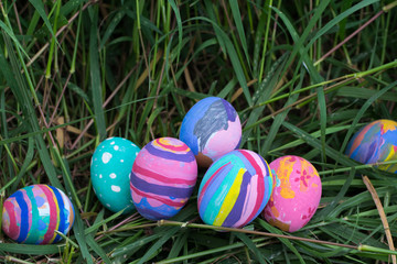 Easter eggs in Green Grass. Selective focus.