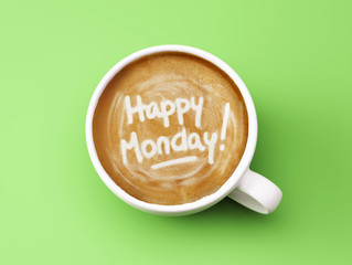Happy Monday Coffee Cup Concept isolated on green background