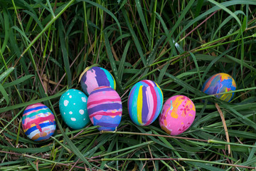 Easter eggs in Green Grass. Selective focus.