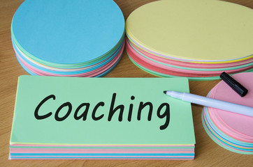 Coaching - abstrakt, auf Moderationskarte geschrieben