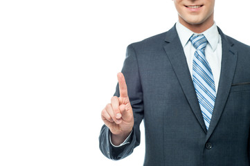 Corporate man showing index finger