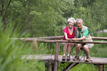 Portrait of senior couple fishing