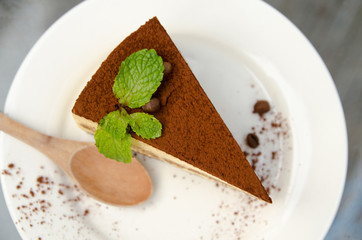 chocolate cake with wood spoon