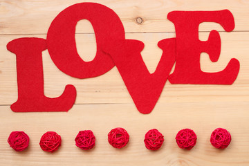 Love sign on wooden background