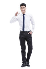 Young businessman drinking water