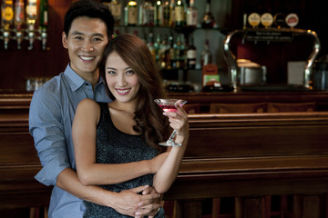 Couple Enjoying Cocktails Together