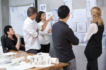  Architects having discussion in studio