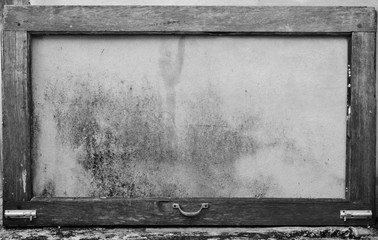 Wood frame and concrete wall black & white