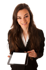 Beautiful young business woman showing tablet with screen for co