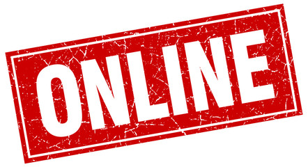 online red square grunge stamp on white