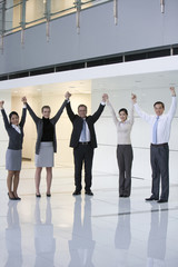 Fototapeta premium Businesspeople cheering