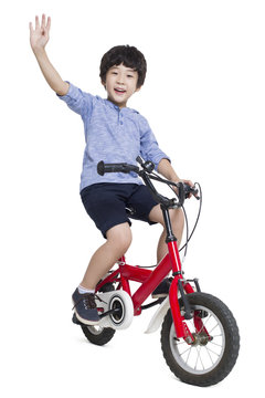 Little boy riding bike