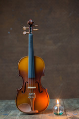 Fototapeta na wymiar violin with lantern on old steel background,still life
