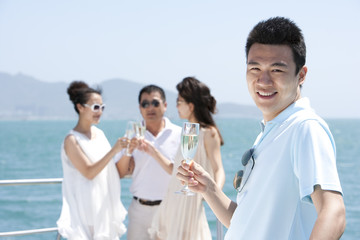 Friends Relaxing on a Yacht