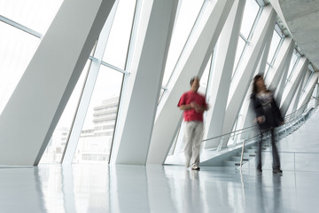 People Rushing through Corridor, Motion Blur