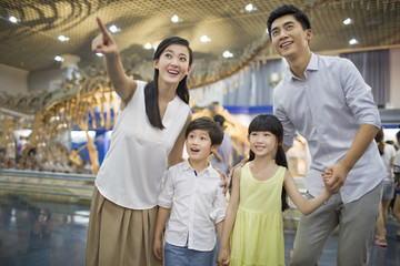 Young family in museum of natural history