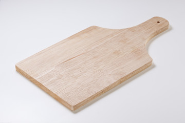 Wooden cutting board.