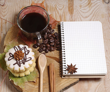 Coffee, cake and notebook