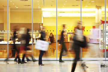 Intentional Blurred Image of People in Shopping Center - Powered by Adobe