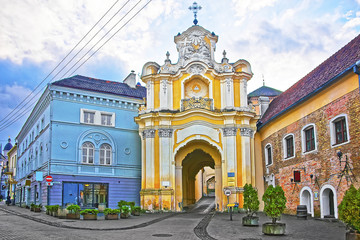 Basilian monastery gate in the Old Town of Vilnius in Lithuania - obrazy, fototapety, plakaty