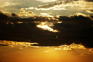 Cloud, illuminated by the setting sun