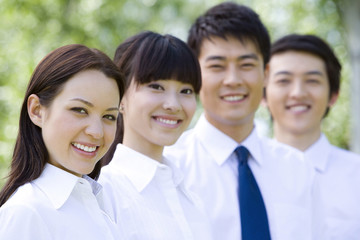 Business professionals in park